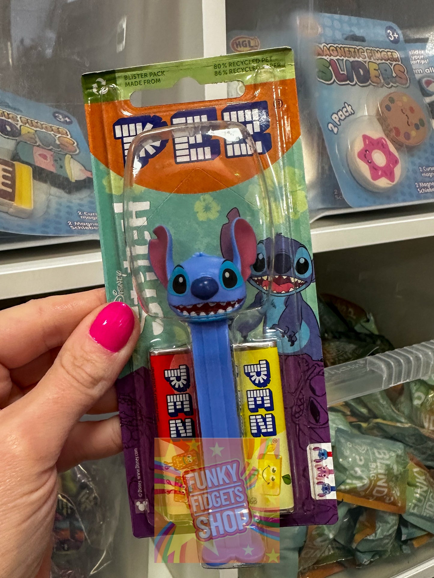 Pez sweet dispenser + 2 packets of Pez sweets