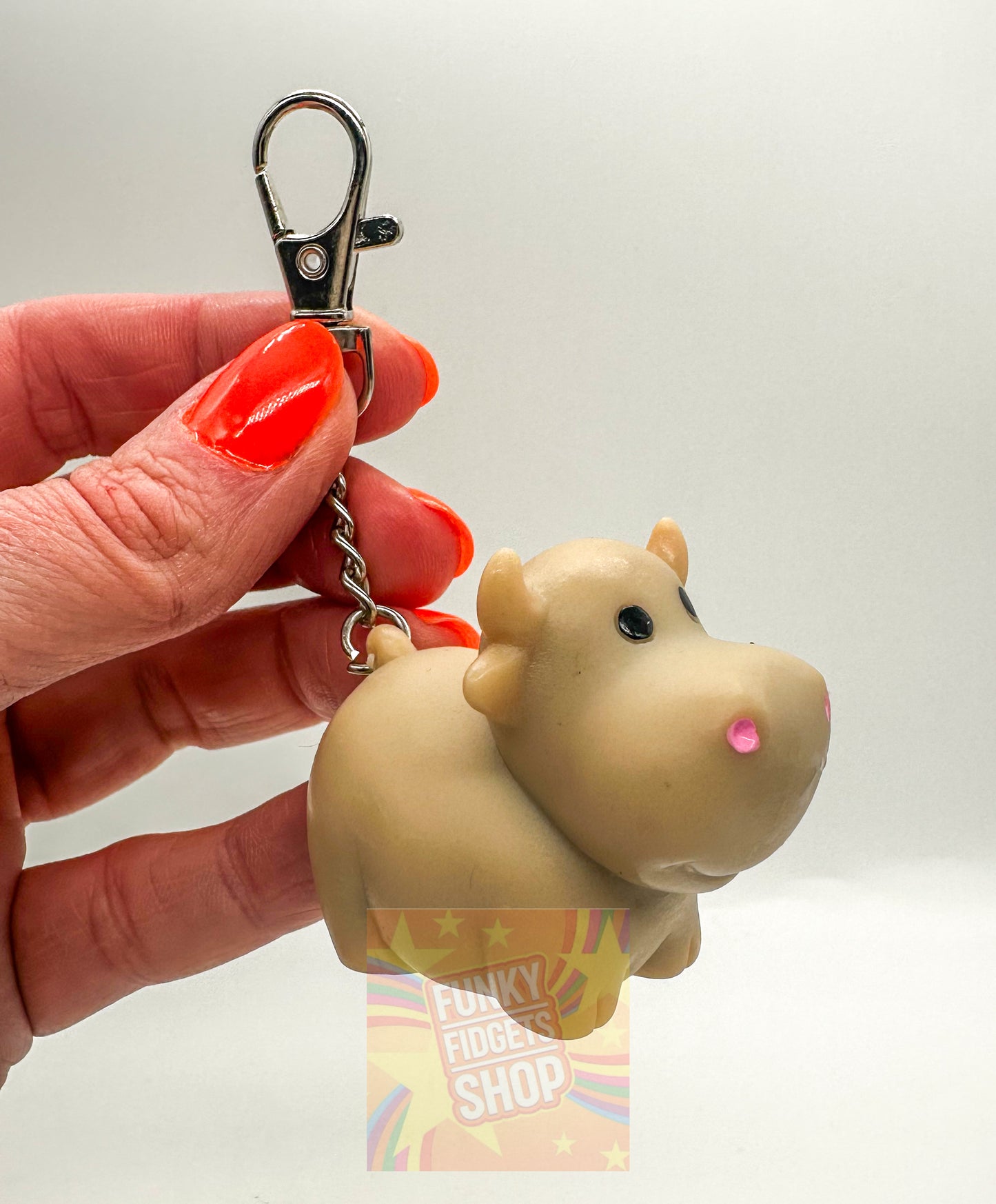 Pooping cow keyring