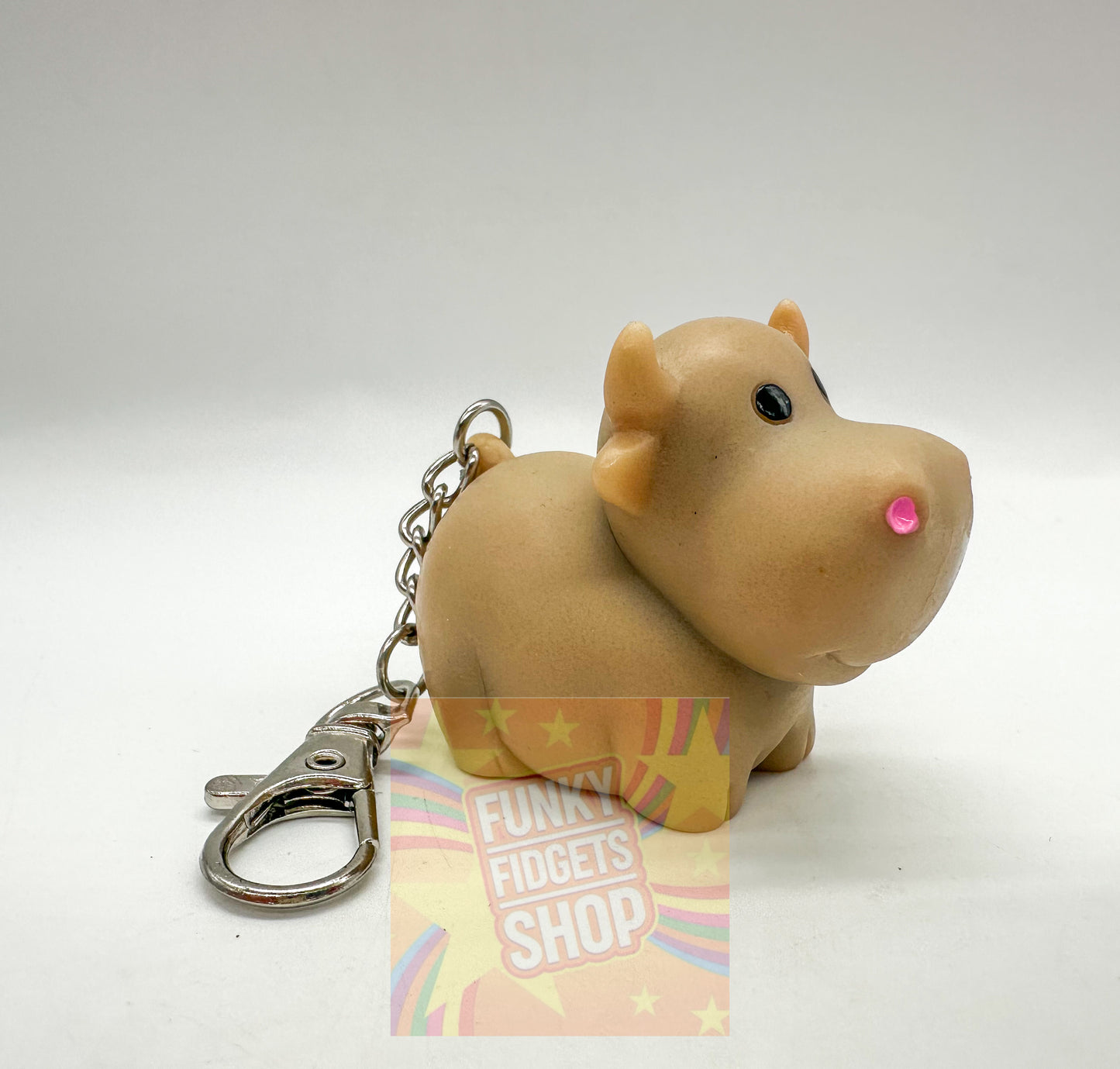 Pooping cow keyring